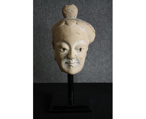 † A 19th century Chinese ceramic head from the Sichuan province. H.47cm. 