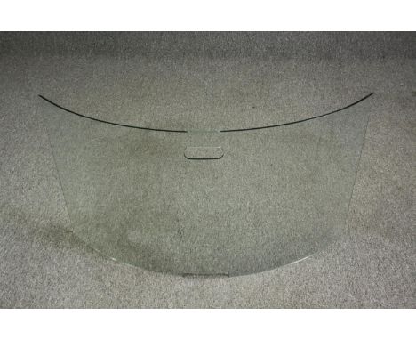A modern curved glass fire screen. H.55 W.96cm. 