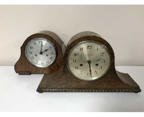 A mahogany cased eight day mantel clock with silvered dial and an oak cased example 