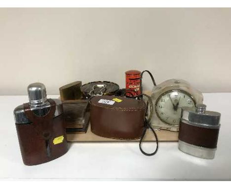 A tray containing two hip flasks, travel clock, cigarette dispenser, mantel clock, cigarette case etc