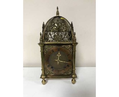 A 17th century style brass lantern clock