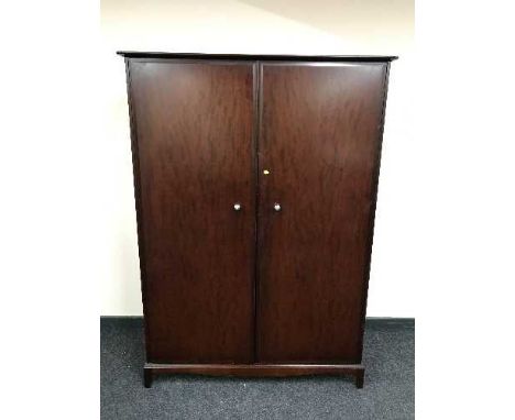 A mahogany Stag Minstrel double wardrobe