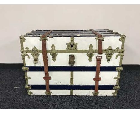 A painted luggage trunk and a continental oil on canvas of a lady 