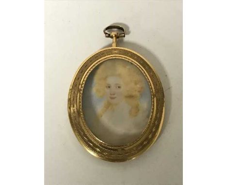 Late 18th century, a gold mounted watercolour portrait miniature depicting a lady in Georgian attire, within a very fine 22ct