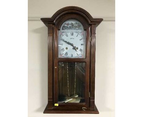 A modern mahogany cased weight driven wall clock