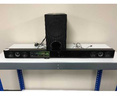 An LG 300 watt sound bar system with speaker and remote 