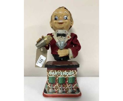 A vintage tin plated bar tender 
