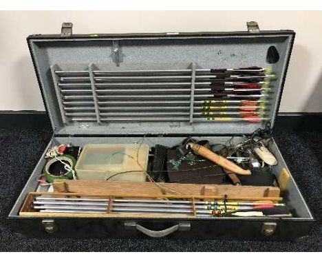 A good collection of archery equipment including five longbows , a large quantity of shooting accessories, arrows, leather qu