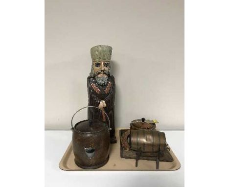 A tray of oak lidded tea caddy, miniature copper beer keg, biscuit barrel, painted wooden bottle holder in the form of a man 