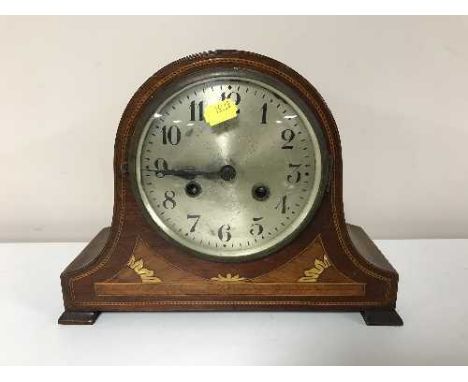 An Edwardian inlaid mahogany mantel clock with silvered dial