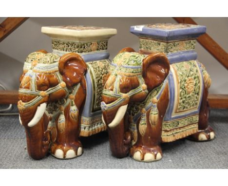 Two Chinese glazed ceramic elephant garden stools, H. 43cm.