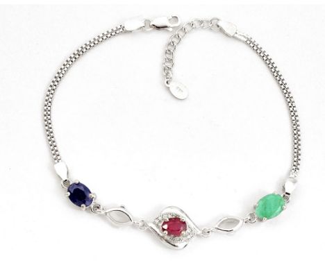 A 925 silver bracelet set with oval cut ruby, sapphire and emerald and white stones, approx. 21cm.