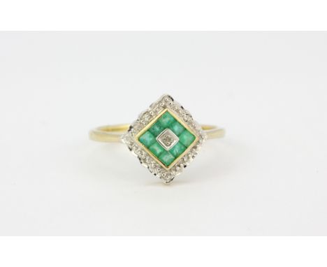 An Art Deco style 9ct yellow gold ring set with emeralds and diamonds, (M).