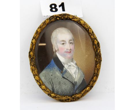A Georgian gilt framed hand painted miniature portrait of a gentleman, 8 x 7cm.