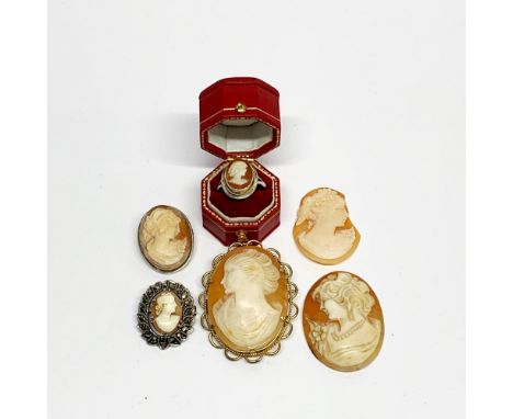 Two silver mounted cameo brooches a silver cameo ring, etc.