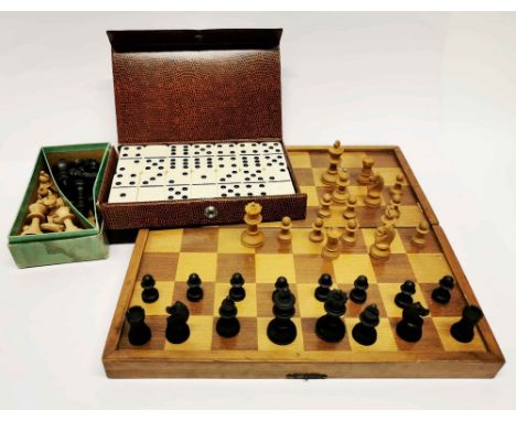 Two turned wooden chess sets and a 1960's set of draughts.