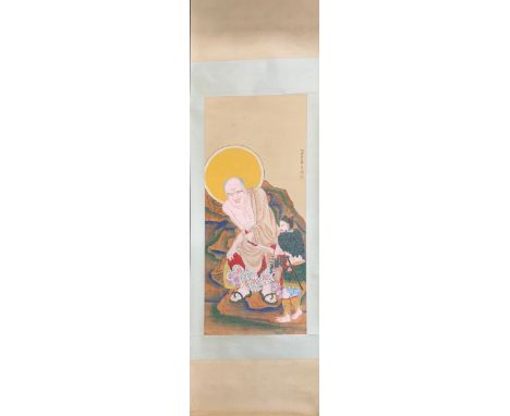 A Chinese scroll painting on silk mounted on paper and silk of an Arhat, size 57 x 207cm.