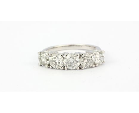 An 18ct white gold ring set with five brilliant cut diamonds, approx. 2.85ct overall, (O.5).