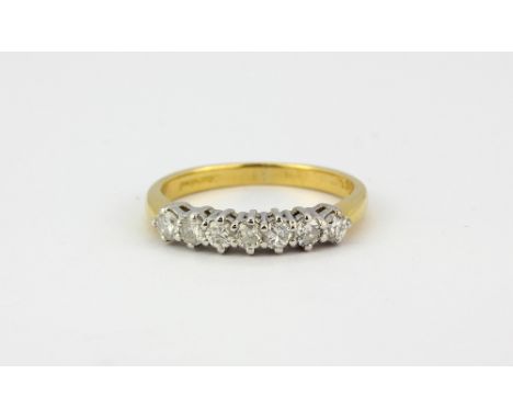 An 18ct yellow gold (750 stamped) half eternity ring set with brilliant cut diamonds, approx. 0.5ct, (L.5).