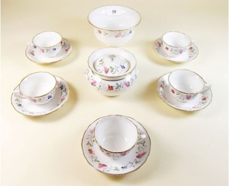 A Davenport Pearlware  floral painted child's part tea service comprising three cups and saucers, covered sugar and milk jug