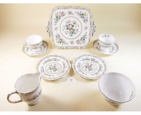 An 'Old Foley' tea service 'Ming Rose' - comprising: six cups and saucers, six tea plates, cake plate, milk and sugar