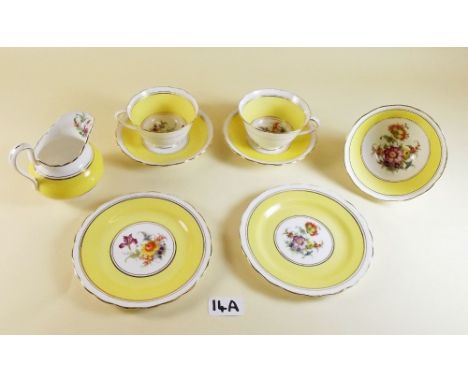 A New Chelsea yellow floral teaset comprising: six cups and saucers (1 a/f), six tea plates, jug and sugar
