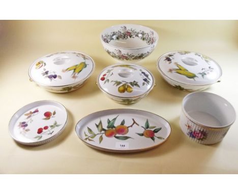 Three Royal Worcester Evesham tureens, one smaller and a large Portmeirion serving bowl, two dishes and one small tureen