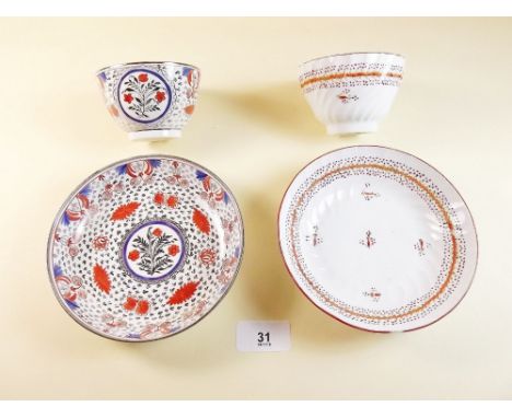 Two decorative tea bowls and saucers circa 1800