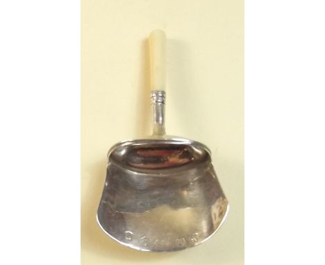 A silver caddy spoon with ivory handle, by SP, Birmingham 1811