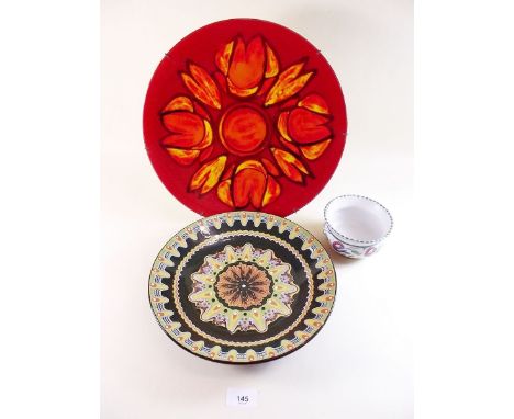 A Poole Aegean charger, a Poole floral bowl and a pottery plate