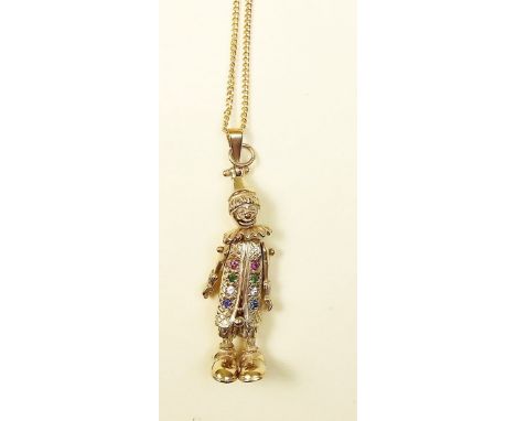 A 9 carat gold novelty clown pendant set multi-coloured gem stones on 9 carat gold chain - 13.5g in total