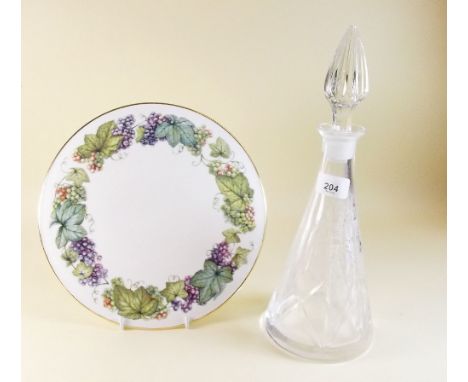 A cut glass decanter and a Royal Worcester cake plate 'Vine Harvest'
