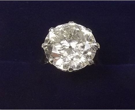A large solitaire diamond ring - approx 5.5 carats - size i
