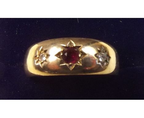 A 9 carat gold ruby and diamond gypsy ring