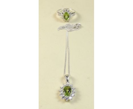 A silver peridot ring and pendant
