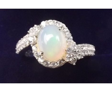 A silver ring set Ethiopian opal - size N