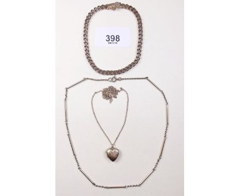 A 9K gold curb link bracelet - 15g, a 9 carat gold heart form locket on gold chain and a gold necklace - 5g