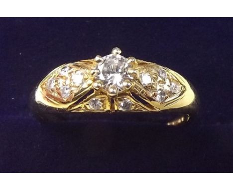 An 18 carat gold diamond set ring - size N