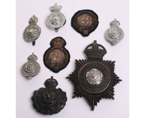 North Riding Constabulary  Badges, Kings crown black star helmet plate, chrome rose centre, Kings crown black wreath cap badg