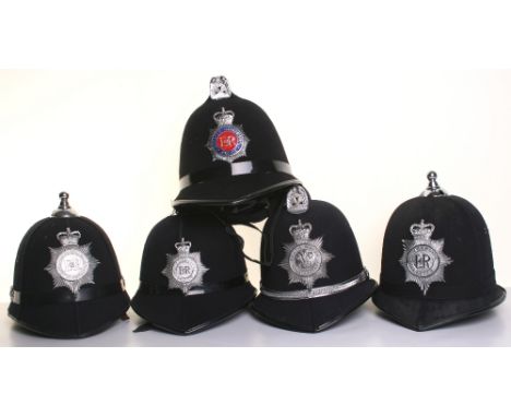 Five Obsolete Police Helmets, all complete with the original helmet pates, consisting of ball top Humberside Police, Cox Comb