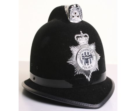 Obsolete EIIR Northumbria Police Cox Comb Helmet, of black velvet cloth body. Original EIIR helmet plate to the front. Genera