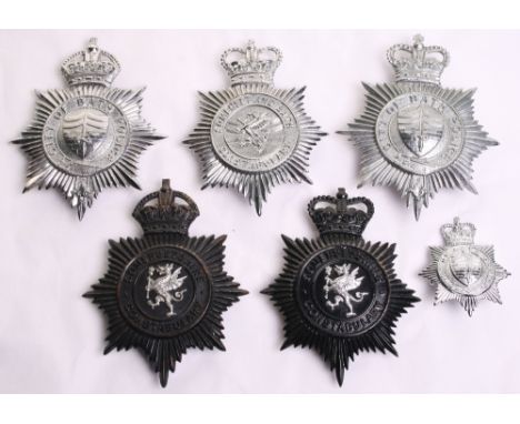 Somerset Constabulary Badges, consisting of Kings crown black helmet plate, similar  EIIR example, chrome EIIR helmet plate, 