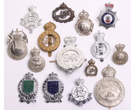 Quantity of Colonial Police Badges, including: Bahamas Police Kings crown helmet plate, British Honduras Police Kings crown w