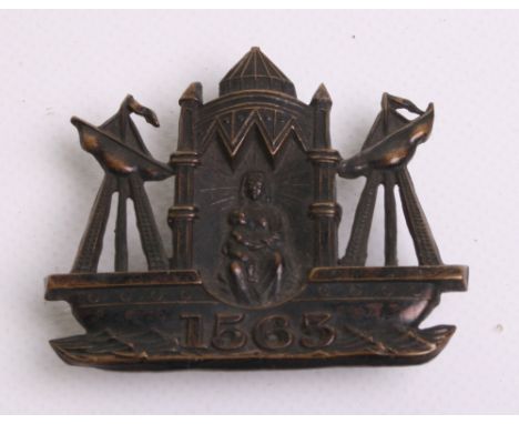 Scarce Leith Burgh Police Night Helmet Badge, black  coat of arms complete with three rear fixing lugs, 