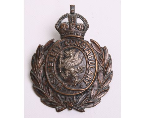 Somerset Constabulary Helmet Badge, black wreath, Kings crown, white metal dragon, with mace complete with two lug fittings o