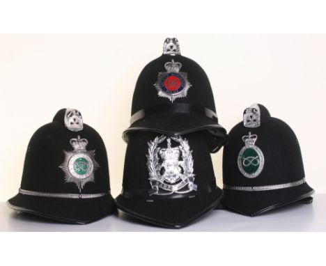 Four Obsolete Pattern Cox Comb Police Helmets, all complete with the original helmet plates, consisting of Staffordshire Poli