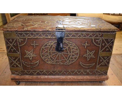 A travelling trunk, with brass stud work decoration, 80 cm wide Condition report Report by RB

General wear, modern strap