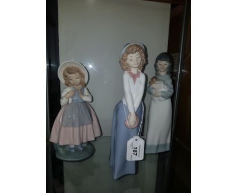 3 ASSORTED NAO FIGURINES