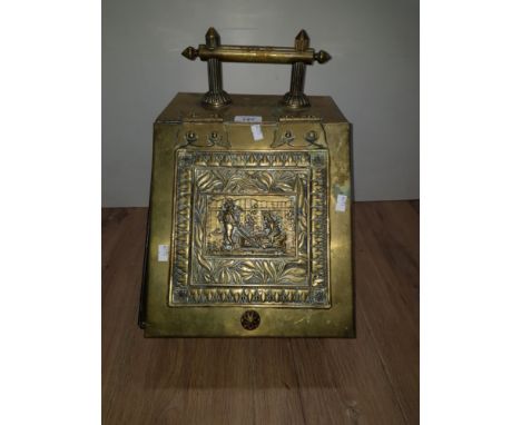A VINTAGE BRASS COAL SCUTTLE