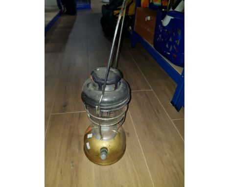 A VINTAGE BRASS TILLEY OIL LAMP
